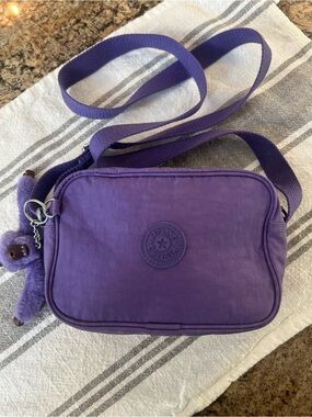 Kipling Vibrant Purple Crossbody with Signature Monkey Charm, almost new euc